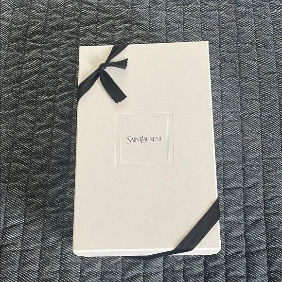 Saint Laurent
Cassandre Envelope Chain Wallet in Lambskin - Picture 12 of 12